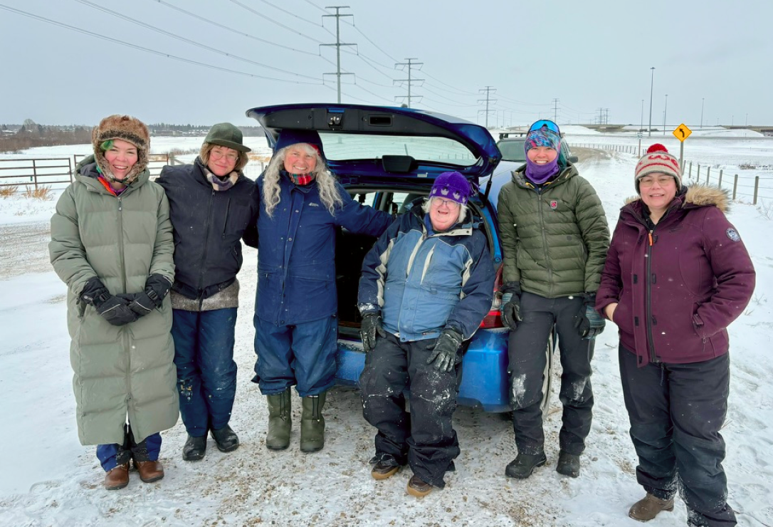 Guild members gathered outdoors, dressed for a winter willow harvest.